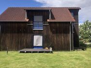 Einfamilienhaus mit einer Lärchenholz Fassade - Rödinghausen