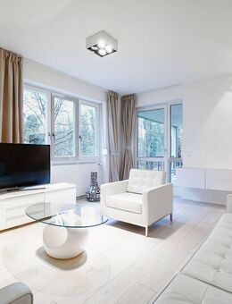 Großzügige Terrassenwohnung. An der Isar im Grünen gelegen. - München