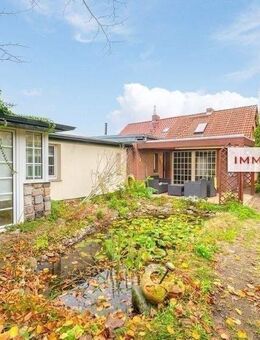 IMMOBERLIN.DE - Angenehmes Haus mit Südgarten in familienfreundlicher Lage - Berlin