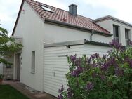 Modernes Einfamilienhaus in Winkelbauweise in Isernhagen-Altwarmbüchen - Isernhagen