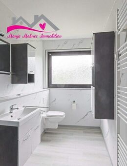 Helle 4-Zimmer-Wohnung im 1. OG mit saniertem Bad und Garage - Schortens
