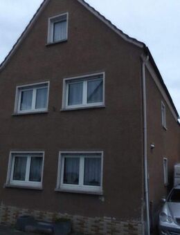 Handwerkerhaus mit Potenzial: 1-2-Familienhaus mit Terrasse, Garten und Option auf Einliegerwohnung! - Buseck