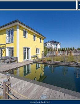 Exklusives Einfamilienhaus mit Naturpool und Doppelgarage in ruhiger Lage - Monheim