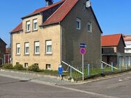 Gemütliches 1-Familienhaus mit großem Grundstück, 2 Garagen und Nebengebäude in Eilsleben - Eilsleben