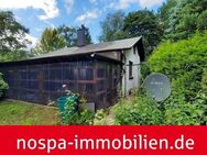 Vollunterkellertes, massiv errichtetes Wochenendhaus auf einem über 1.000 m² großem Grundstück! - Dörpstedt