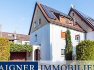 AIGNER - Harmonisches Ensemble: Mehrfamilienhaus verbunden mit charmantem Einfamilienhaus - München