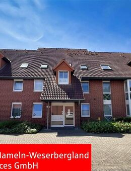 Attraktive 2 Zimmer-Dachgeschosswohnung mit Balkon im Herzen von Emmerthal - Emmerthal