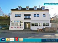 Mertesdorf: Mehrparteienhaus mit 6 Einheiten, Außenstellplätzen und einer Garage in schöner Lage - Mertesdorf