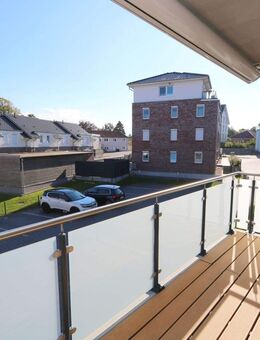 Moderne 2,5-Zimmer-Wohnung in energieeffizientem Haus mit Süd-Ost Balkon, Abstellraum und Stellplatz - Grömitz