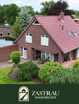 Privatsphäre pur: Exklusives Einfamilienhaus mit Traumgarten in Großheide - Großheide