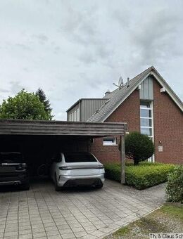 Exklusive Oberwohnung mit 3 ZKB, G-WC, Dachterrasse & Carportstellplatz in Jaderberg - Jade