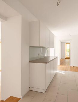 AIGNER - Erstbezug - 4-Zimmer-Erdgeschosswohnung mit sonniger Terrasse im St.-Benno-Viertel - München