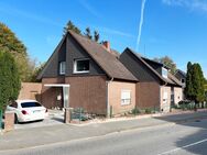 Einfamilienhaus mit Anbau, Einliegerwohnung und Garage - Hammoor