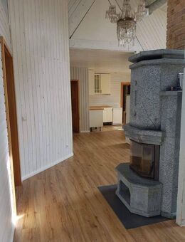 Charmantes finnisches Holzhaus mit ebenerdiger Bauweise und modernisierten Innenräumen - Wathlingen