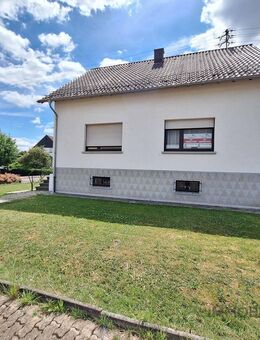 Grundstück mit Zweifamilienhaus - Weiskirchen