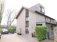 Topmodernisierte, gepflegte Doppelhaushälfte mit Garage, Stellplatz, Südterrasse und Garten - Lastrup
