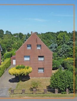 Dreifamilienhaus mit großzügigem Grundstück in zentraler Lage von Voerde-Friedrichsfeld! - Voerde (Niederrhein)