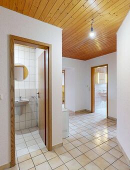 Schöne 2,5 Zimmer-Dachgeschosswohnung mit PKW Stellplatz und Balkon in Karlsdorf-Neuthard - Karlsdorf-Neuthard