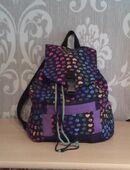 Rucksack bunte Pfötchen mit lila in 59425