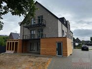 IMMOBILIEN GUMNIOR präsentiert: nachhaltiges Wohnen in 3-Zimmer-Dachgeschosswohnung mit Balkon - Rheine