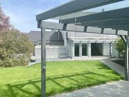 "Modernes Familienhaus am Wörthsee: Energieeffizient und stilvoll in Splitlevel-Architektur" - Wörthsee