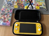 Nintendo Switch Lite + Spiele - Wardenburg