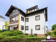 BERK Immobilien - Vielseitiges Mehrfamilienhaus mit Einliegerwohnung und Nebengebäude - Rodenbach (Hessen)