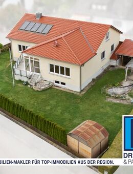 Einfamilienhaus auf großem Eckgrundstück mit Wintergarten und Garage - Weichering