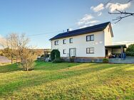 Modernisiertes Zweifamilienhaus mit hübschem Garten in herrlicher Wohn- und Aussichtslage! - Schöneberg (Landkreis Altenkirchen (Westerwald))