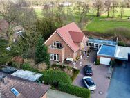 Attraktives Zweifamilienhaus in idyllischer Lage - Saterland