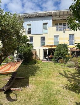 4-Zimmer-Eigentumswohnung über zwei Ebenen mit Gartenanteil - Tornesch