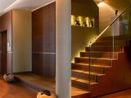 Stylisch-repräsentative Maisonette-Gartenwohnung in Toplage - München