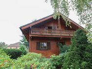 Behagliches Flair: Gepflegtes Timberhaus mit großem Garten, Kamin und Sauna - Oranienburg