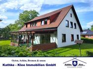Schmuckstück in Otterstedt: Einfamilienhaus mit Garage, überd. Terrasse, Ausbaureserve im DG u.v.m. - Ottersberg