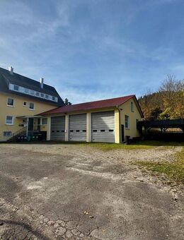 Renditestarkes 3-Parteienhaus mit Großgaragen - Enzklösterle