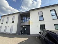 Moderne Erdgeschosswohnung mit überdachter Terrasse, Garten und Weitblick - ruhige Lage in Echternacherbrück-Fölkenbach - Echternacherbrück