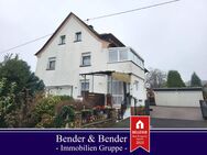 Familienidylle in Hillscheid - Einfamilienhaus mit Einliegerwohnung, 2 Garagen und sonnigem Garten! - Hillscheid