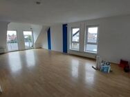 Mehrfamilienhaus mit Balkonen in Oktriftel - Hattersheim (Main)