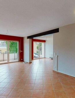 Charmante 3-Zimmer-Hochparterrewohnung mit Balkon, Garage und Gartennutzung in Au am Rhein - Au (Rhein)