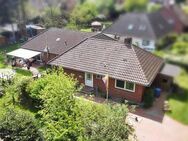 immo-schramm.de: Großzügiger Walmdach-Winkelbungalow - Axstedt