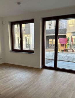 NEUBAU! Lichtdurchflutete Wohnung zum Verweilen mit Garten mit EBK (ablösbar) - Bamberg