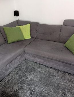 Graues Ecksofa mit Schlaffunktion - Münster