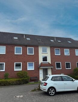 Büsum: Schicke Hochparterre-Wohnung mit Westbalkon in ruhiger Zentrumslage - Büsum