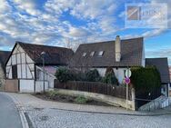 Interessantes Anwesen mit Wohn- und Geschäftshaus, Scheune und Garten in Castell - Castell