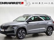 Skoda Karoq, 2.0 TSI Sportline PARKL EL SITZE HECKKL, Jahr 2024 - Suhl