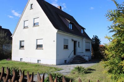 Einfamilienhaus mit großem Grundstück in Top Lage