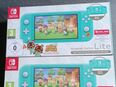 2 × Nintendo Switch Lite inkl 128GB Speicherkarte in 53721
