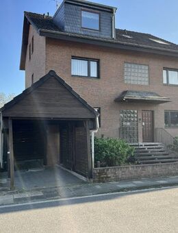 3-Zimmer Dachgeschosswohnung mit Balkon, Garage und eigenem Garten in Moers-Vennikel - Moers