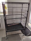 Biete großen Vogelkäfig mit viel Zubehör in 24937