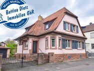 DIETZ: Stilvolles Einfamilienhaus mit Einliegerwohnung und schönem Garten in Schaafheim OT Radheim! - Schaafheim